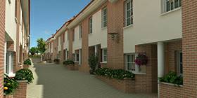 Vue de la rue centrale d'un ensemble pavillonnaire à Valdemoro . Espagne